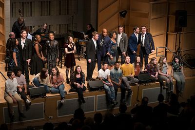 Full cast (standing), students from the Rosetta LeNoire Musical Theatre Academy (seat Photo