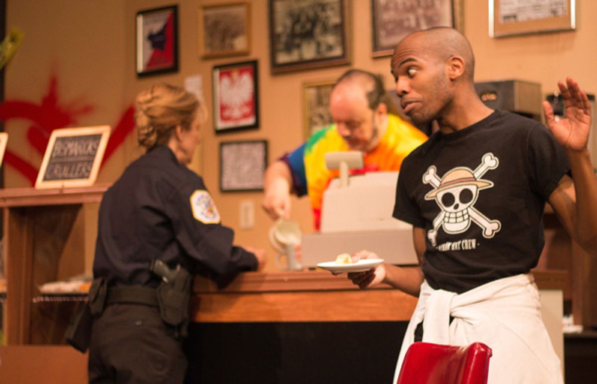 Ellie DeShon (Officer Randy Osteen, back turned), Bill Pelletier (Arthur), Evan Lovelace (Franco) and Bill Pelletier (Arthur) in SUPERIOR DONUTS at Olathe Civic Theatre Association. Photo by Shelly St at 