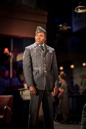 Martins Imhangbe as Sam Mitchum Photo