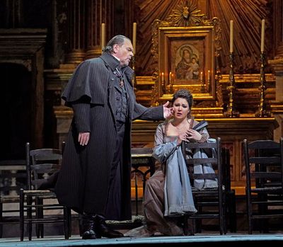 Michael Volle as Scarpia and Anna Netrebko in the title role of Puccini's "Tosca." Ph Photo