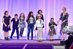 Actress and model Amber Valletta and little brothers and sisters who walked in the BBBSLA Accessories For Success Luncheon fashion show. @ BroadwayWorld Actress and model Amber Valletta and little brothers and sisters who walked in the BB Photo