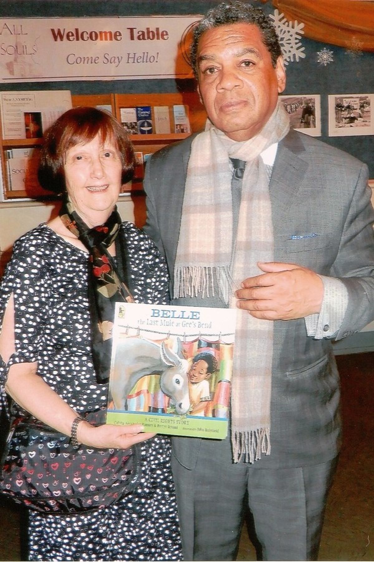 Linda Rousseau (left) of The All Souls Peace and Justice Task Force (PJTF) greets author / playwright Calvin Alexander Ramsey (right) following the performance of the adaptation of his children's book 'The Last Mule At Gee's Bend' which was recently prese at 