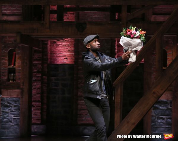 Donald Webber with flowers, a retirement gift,  for Chancellor of NYC Department of E Photo