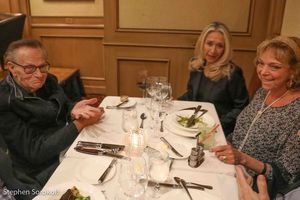 Dean Larry King at his table Photo