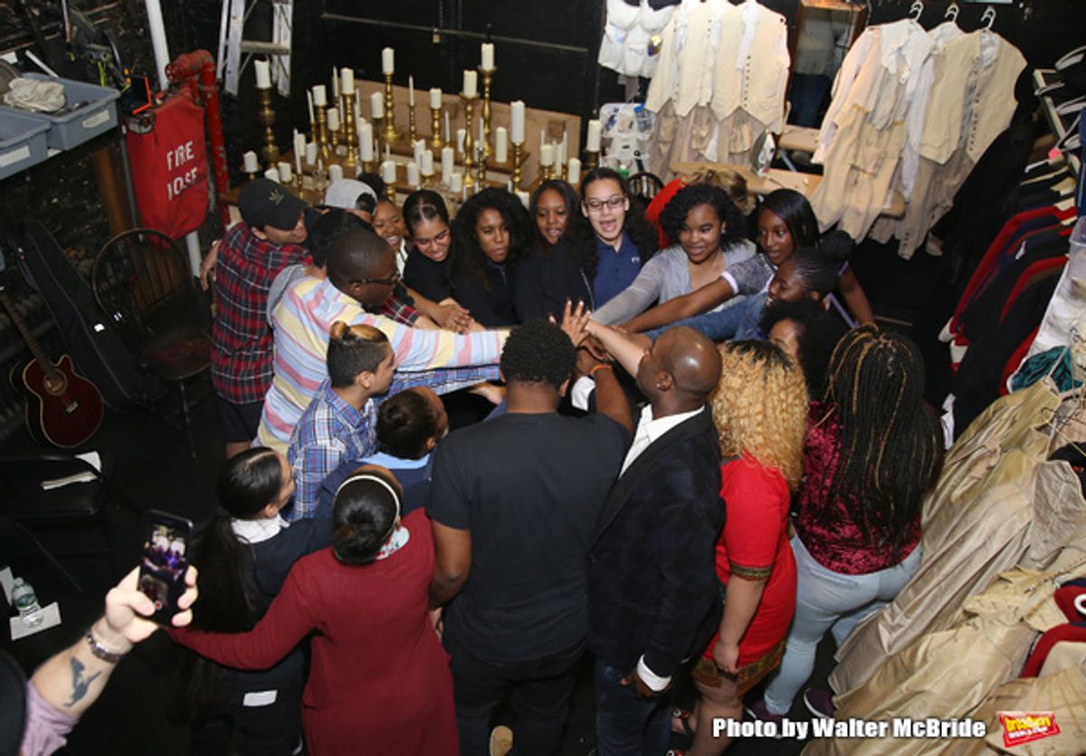 Justin Dine Bryant with High School Student performers at 