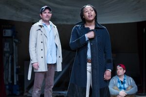 Joan (Dria Brown) informs Dunois, Bastard of OrlÃ©ans (Eric Tucker) that their sold Photo