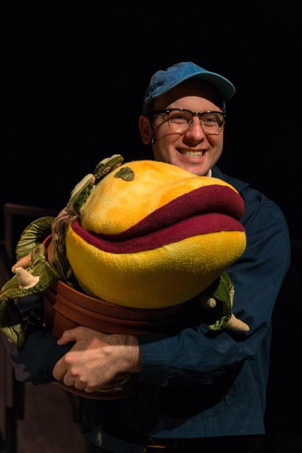 NICLAS OLSON (Seymour) and AUDREY II from the Lakewood Playhouse Production of 'LITTLE SHOP OF HORRORS'
 at 