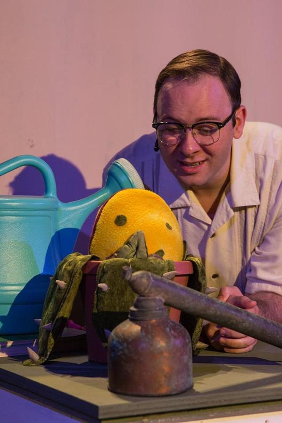 NICLAS OLSON (Seymour) and AUDREY II from the Lakewood Playhouse Production of 'LITTLE SHOP OF HORRORS'
 at 