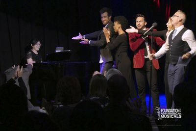 the cast and audience show their appreciation for music director Jennifer Lin Photo