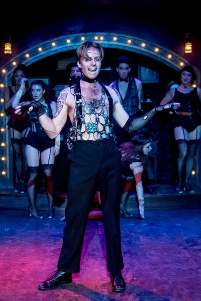 Alex Nee (center) as the Emcee with the ensemble star in the Celebration production o Photo