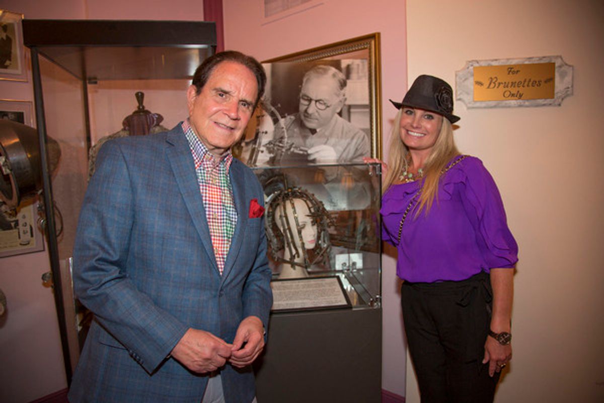 The Legendary Rich Little with daughter Bria Little pose with image of the building namesake, Max Factor at 