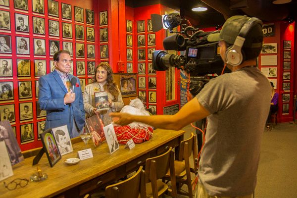Rich Little and Donelle Dadigan (President/Founder of Hollywood Museum) give intervie Photo