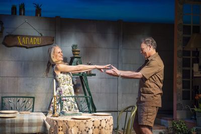 Wife Gladys (Wendy vanden Heuvel) and husband Piet (Victor Talmadge) prepare for a di Photo