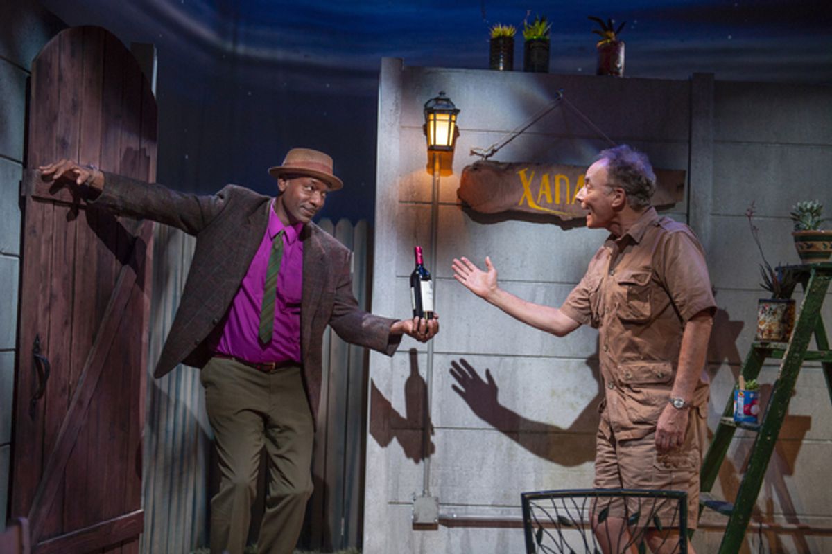 Steve (Adrian Roberts) brings Piet (Victor Talmadge) a gift when he arrives for dinner in 'A Lesson From Aloes,' performing June 3-29 at Z Below.
 at 