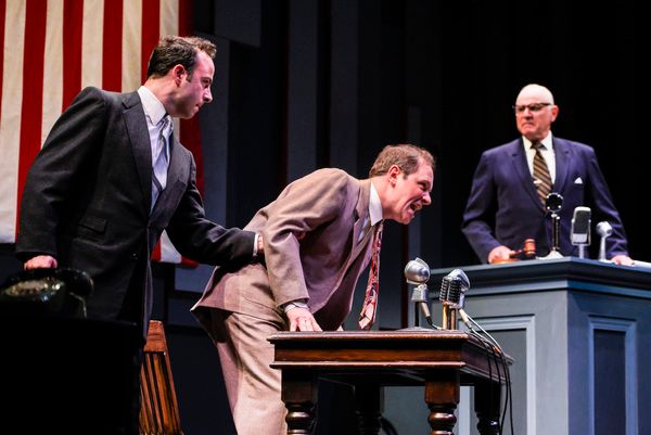 L-R: Sgt. at Arms (George Psarras) removes an unruly Mickey (Jim Stanek), after quest Photo