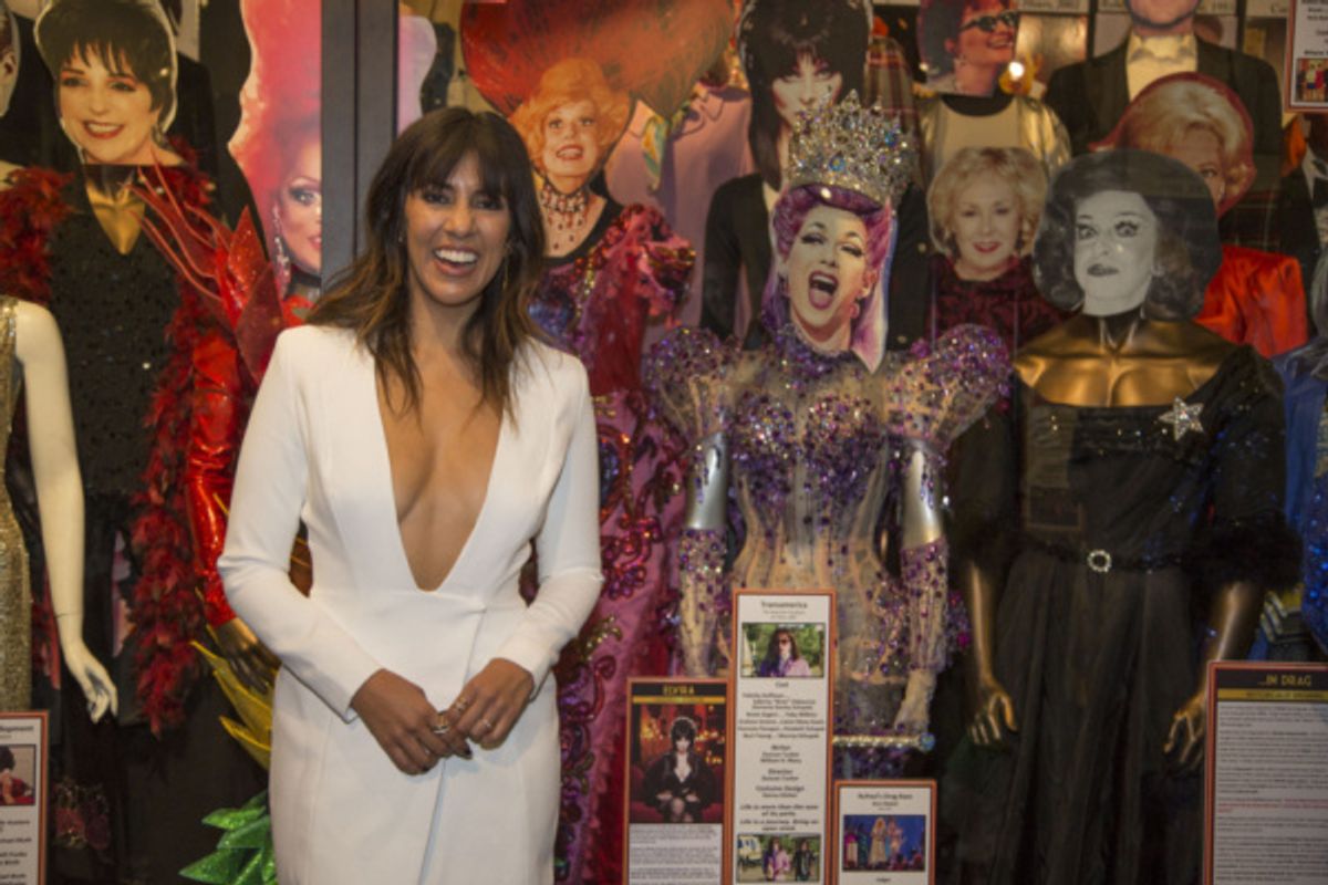 Honoree Stephanie Beatriz with costumes on display worn by LGBTQ Icons and Legends at 