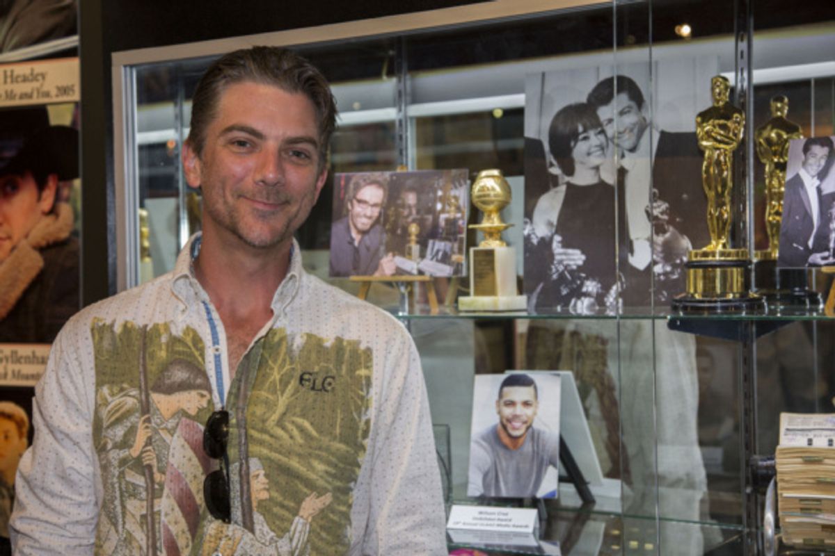 Jeremy Miller with wards won by George Chakiris and Wilson Cruz at 