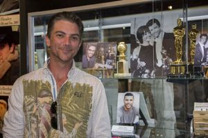Jeremy Miller with wards won by George Chakiris and Wilson Cruz Photo