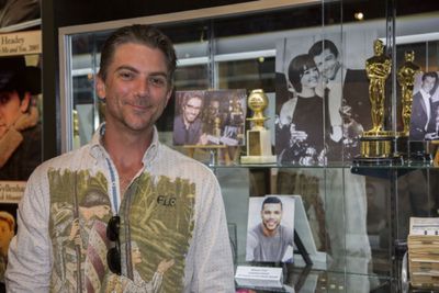 Jeremy Miller with wards won by George Chakiris and Wilson Cruz Photo
