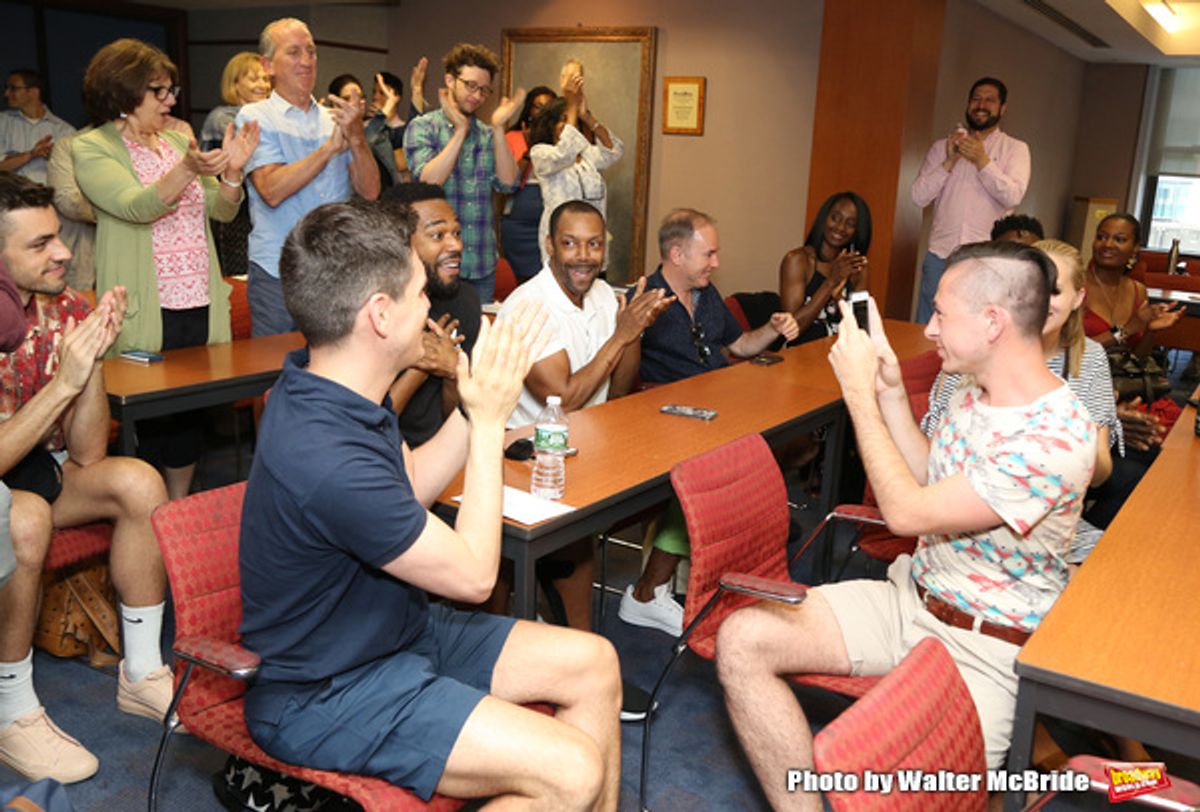 Grasan Kingsberry, T. Oliver Reid and Stephen Flaherty with company at 