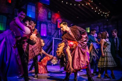 Dance at the Gym: Eric Rivas as Bernardo and Marisa Rivera as Anita with cast Photo