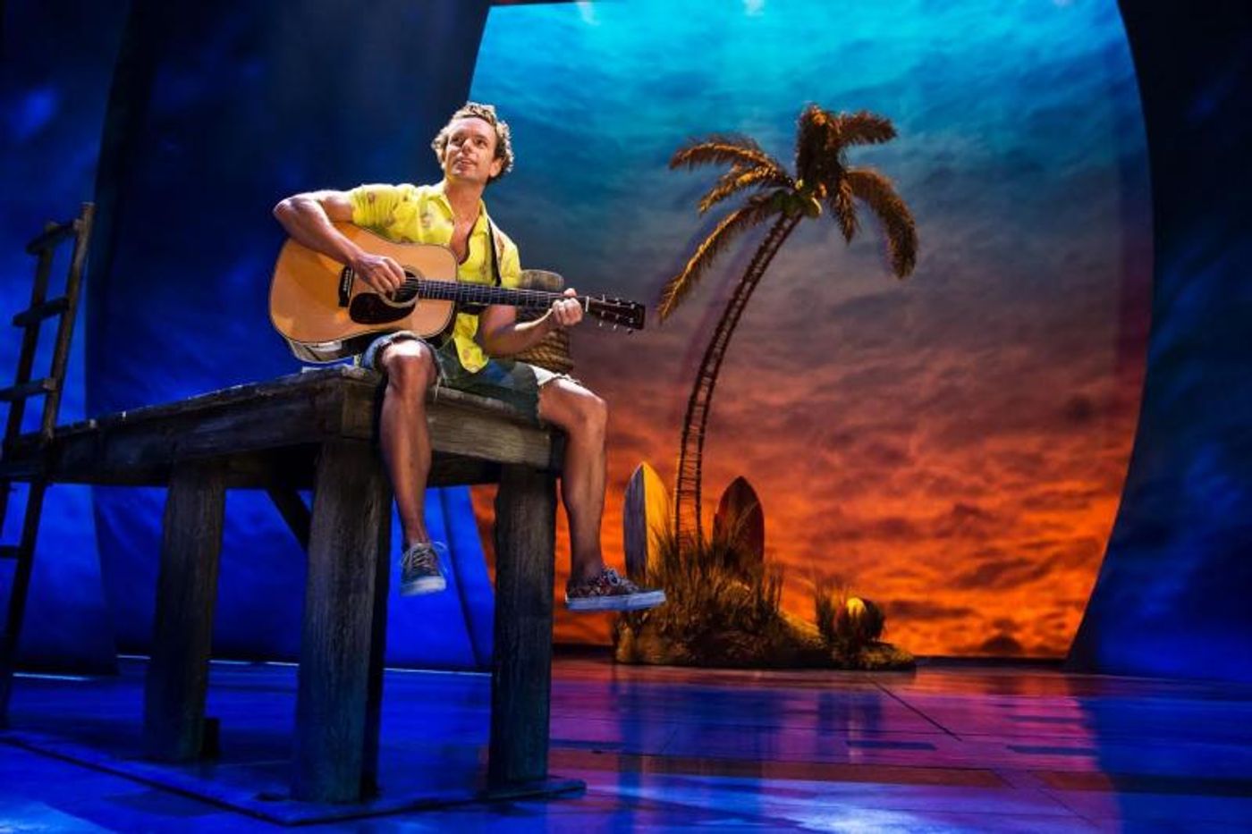 Design-Focused 'in 1: the podcast' Welcomes ESCAPE TO MARGARITAVILLE Scenic Designer Walt Spangler  Image