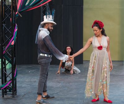 Evan Lewis Smith (Oberon), Aisha Kabia (Titania) and in back, Kelvin Morales (Puck) Photo
