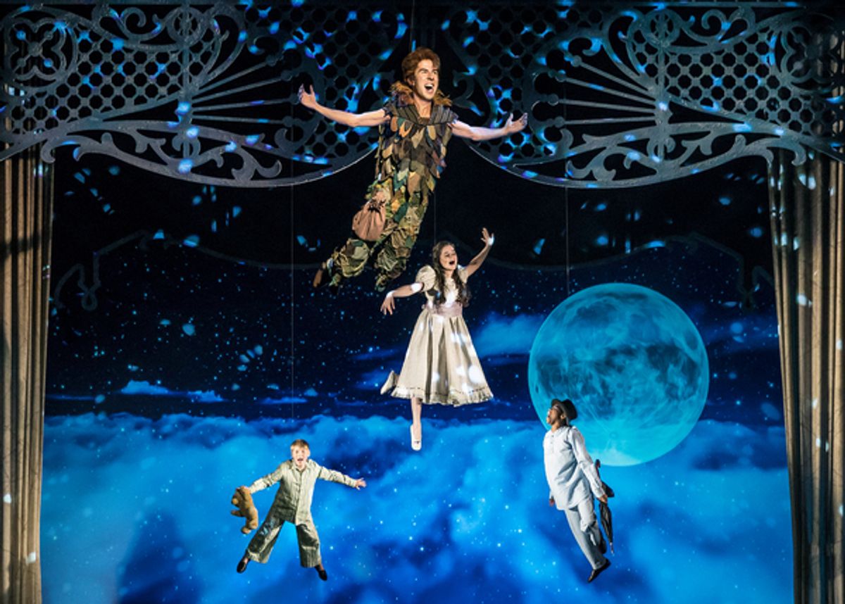 Peter Pan (Johnny Shea) leads the Darling siblings (Carter Graf, Elizabeth Stenholt, and Cameron Goode) on a high-flying adventure to Neverland in Peter Pan â€“ A Musical Adventure, directed and choreographed by Amber Mak, in the Courtyard Theater, June 2 at 