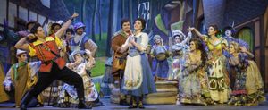 John Detty (Gaston), Ian Morel (Lefou), Emily Heck (Belle) and the cast of Beauty & t Photo