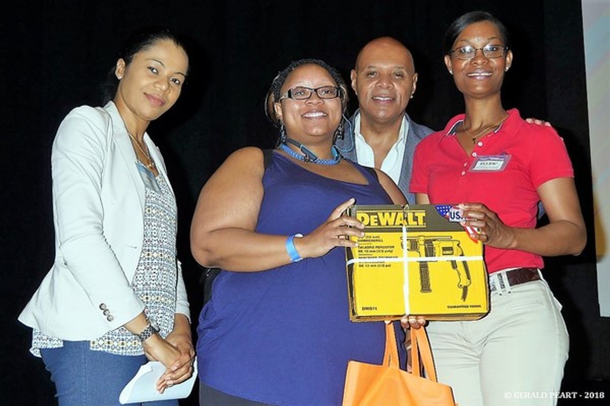 BSDC / Lowe's Dewalt Drill raffle winner   Angela Miller (second from left) is congratulated by a Loweâ€™s representative (left),  nationally syndicated Radio Personality Lenny Green (second from right), 'The Quiet Storm' WBLS Radio (107.5FM) and  Lowe's  at 