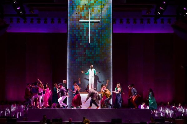 Ronald Peet, a member of the Street Chorus (center) and the cast of Lincoln Centerâ Photo