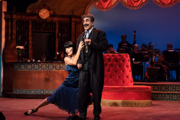 Dreya Weber as Penelope Martin and Frank Ferrante as Groucho Marx  Photo