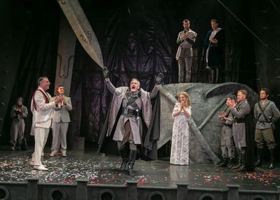 Robert Cuccioli as Marcus, Bruce Cromer as Titus Andronicus, Fiona Robberson as Lavin Photo