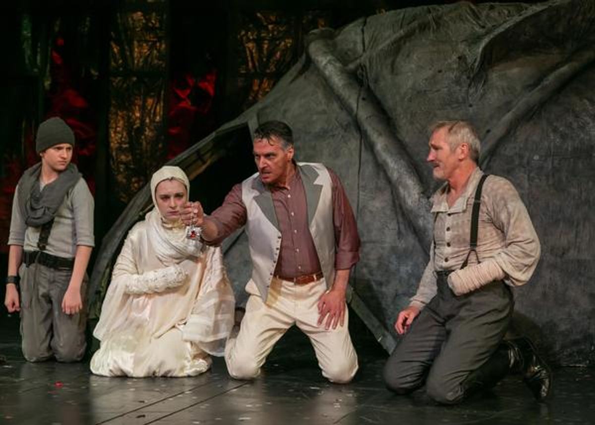 AJ DeAugustine as young Lucius, Fiona Robberson as Lavinia, Robert Cuccioli as Marcus, and Bruce Cromer a Titus Andronicus. Photo credit: Jerry Dalia. at 