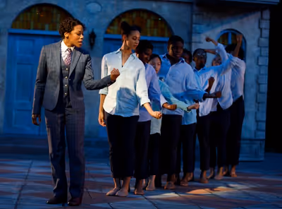 Nikki M. James (foreground) with the RED community ensemble Photo