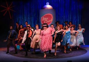 Bethany Slomka (Tracy) and the Company of Hairspray Photo