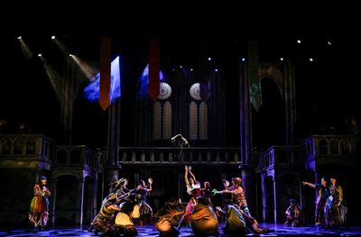 David  Burnham  (center  above)  as  Quasimodo,  Janaya  Mahealani  Jones  (center)  Photo