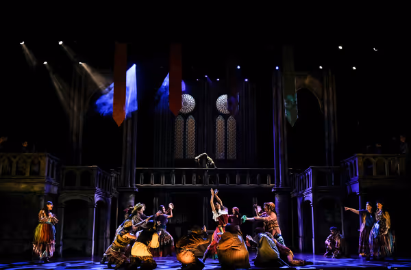  David  Burnham  (center  above)  as  Quasimodo,  Janaya  Mahealani  Jones  (center)  Photo