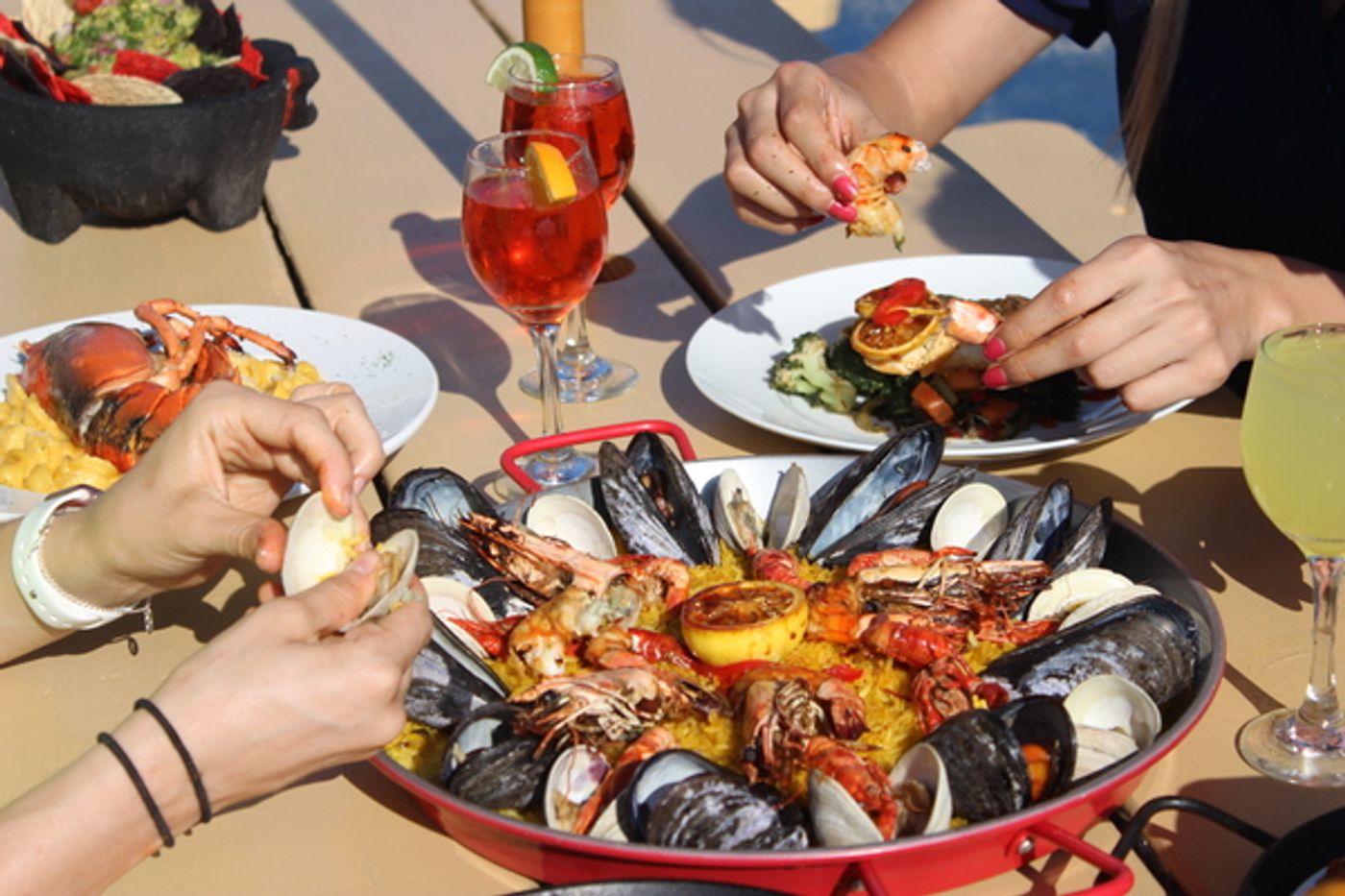 SURF CITY in Jersey City is Serving 10 New Paella Dishes through 8/26  Image