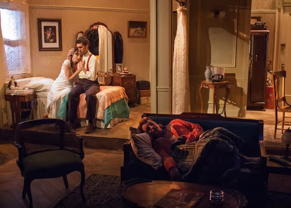 While her sister Rose (Bri Sudia, right) sleeps in the other room, Lusia (Emily Berma Photo