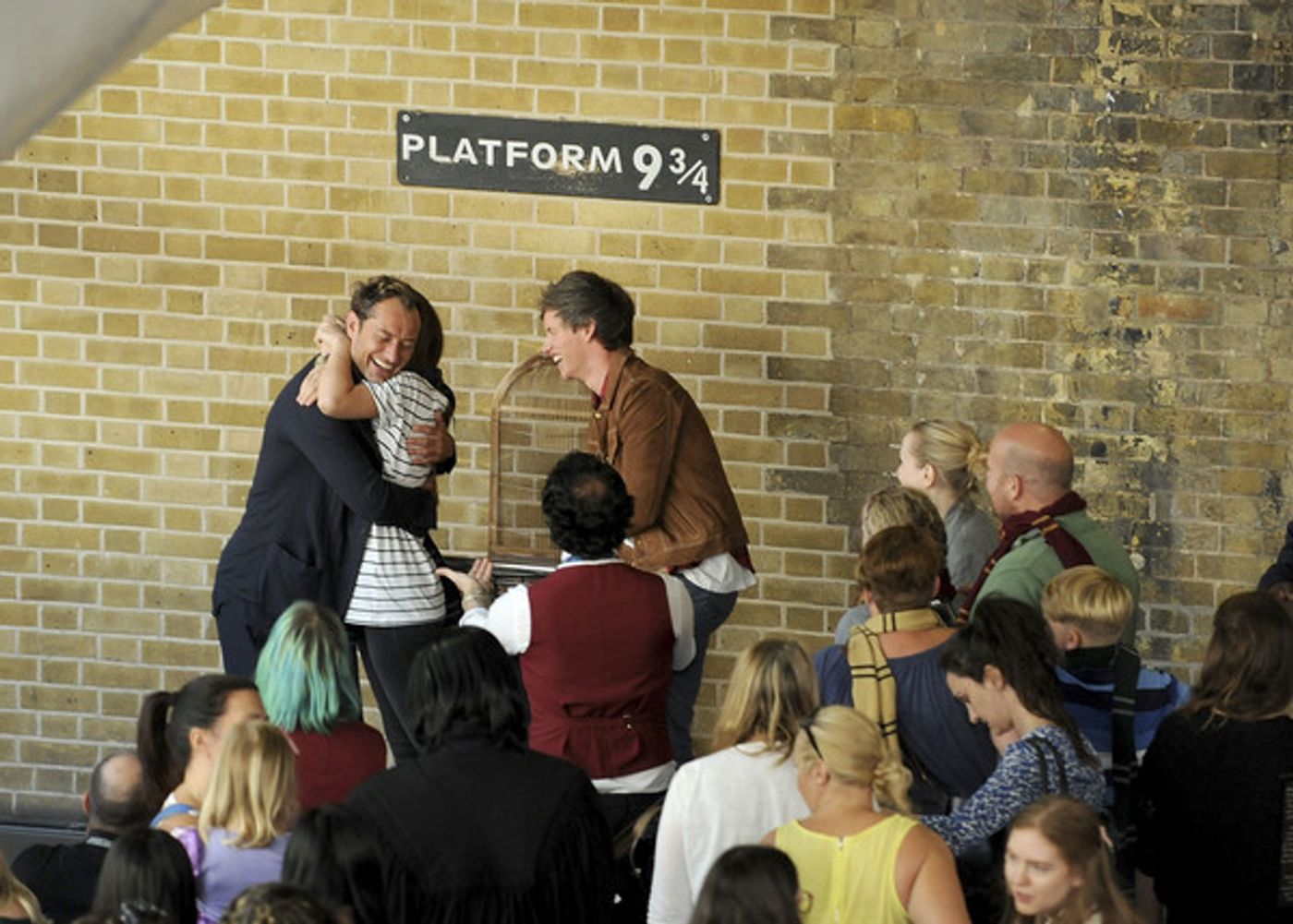 Photo Coverage: See Eddie Redmayne and Jude Law at King's Cross Station for 'Back to Hogwarts' Day  Image