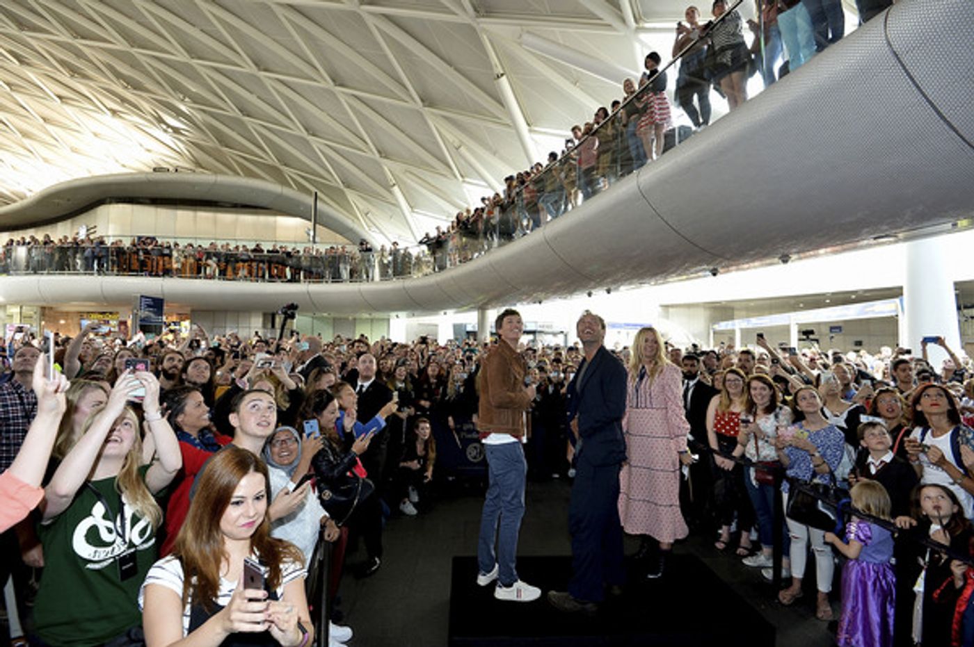 Photo Coverage: See Eddie Redmayne and Jude Law at King's Cross Station for 'Back to Hogwarts' Day  Image