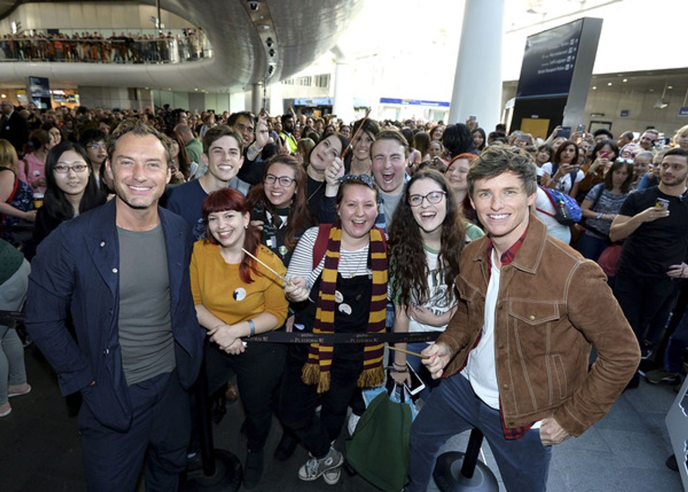 Photo Coverage: See Eddie Redmayne and Jude Law at King's Cross Station for 'Back to Hogwarts' Day  Image