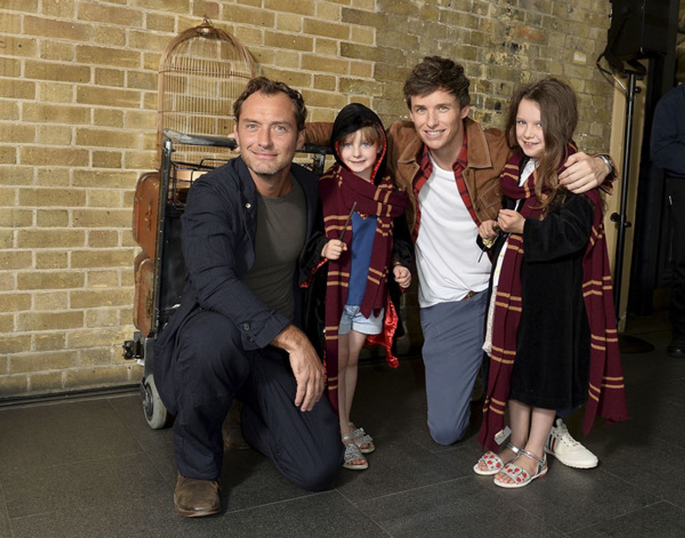 Photo Coverage: See Eddie Redmayne and Jude Law at King's Cross Station for 'Back to Hogwarts' Day  Image