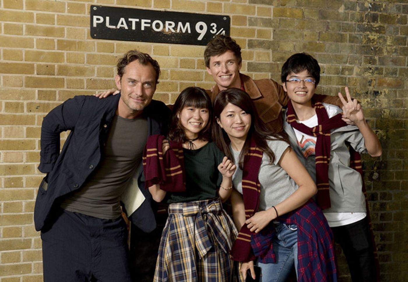Photo Coverage: See Eddie Redmayne and Jude Law at King's Cross Station for 'Back to Hogwarts' Day  Image