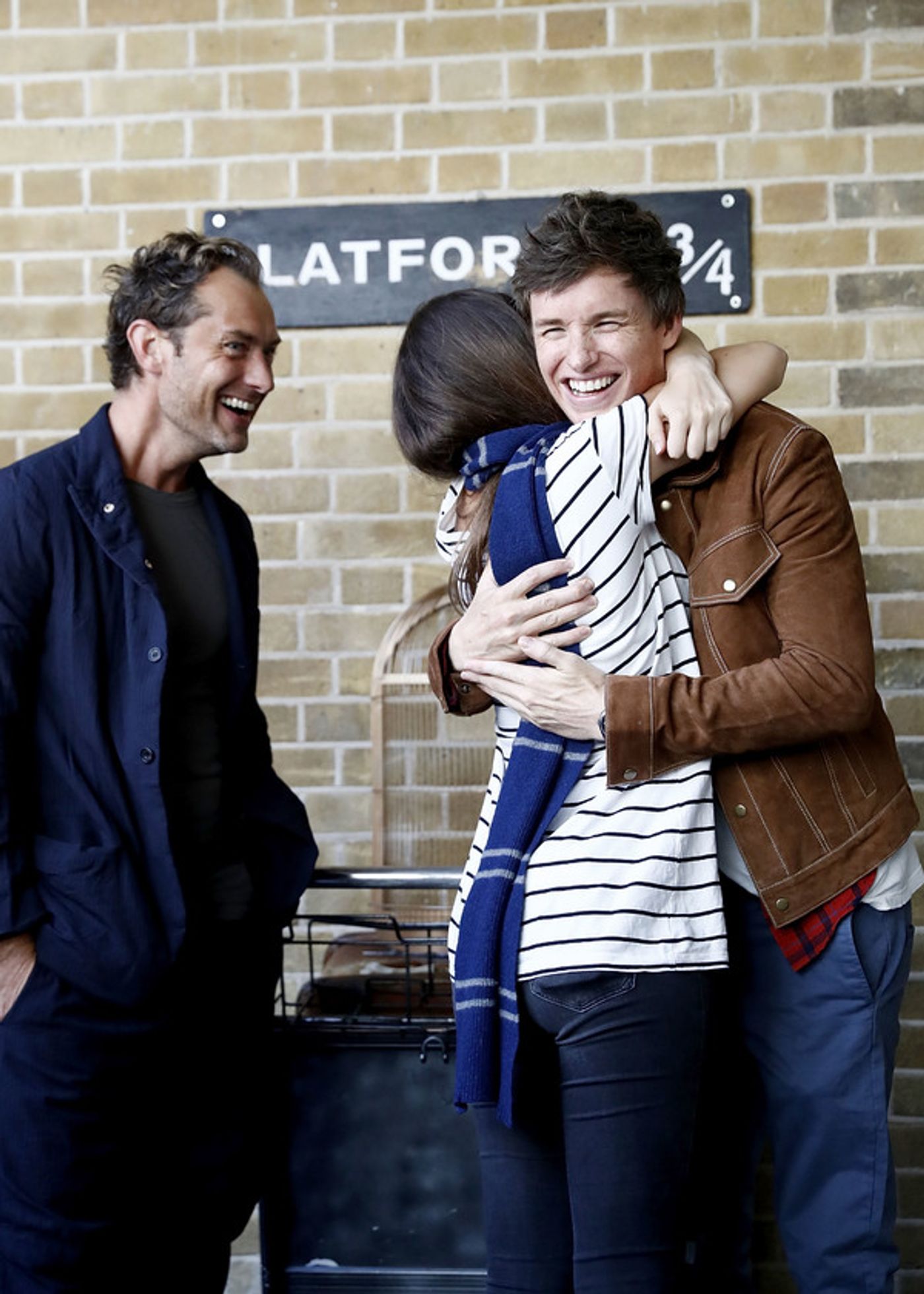 Photo Coverage: See Eddie Redmayne and Jude Law at King's Cross Station for 'Back to Hogwarts' Day  Image
