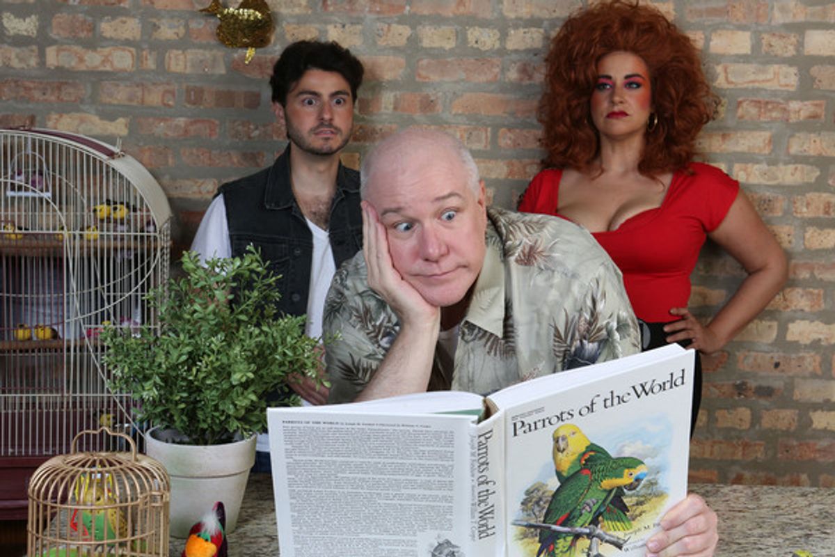 The new employee, Zachary Slade (David Lipschutz), and Roxanne Nurdiger (Sydney Genco) make evil plans as (front) Roxanne's husband, Chester (Ed Jones) reads in a publicity image for Hell in a Handbag Productionsâ€™ comedy THE ARTIFICIAL JUNGLE.  at 