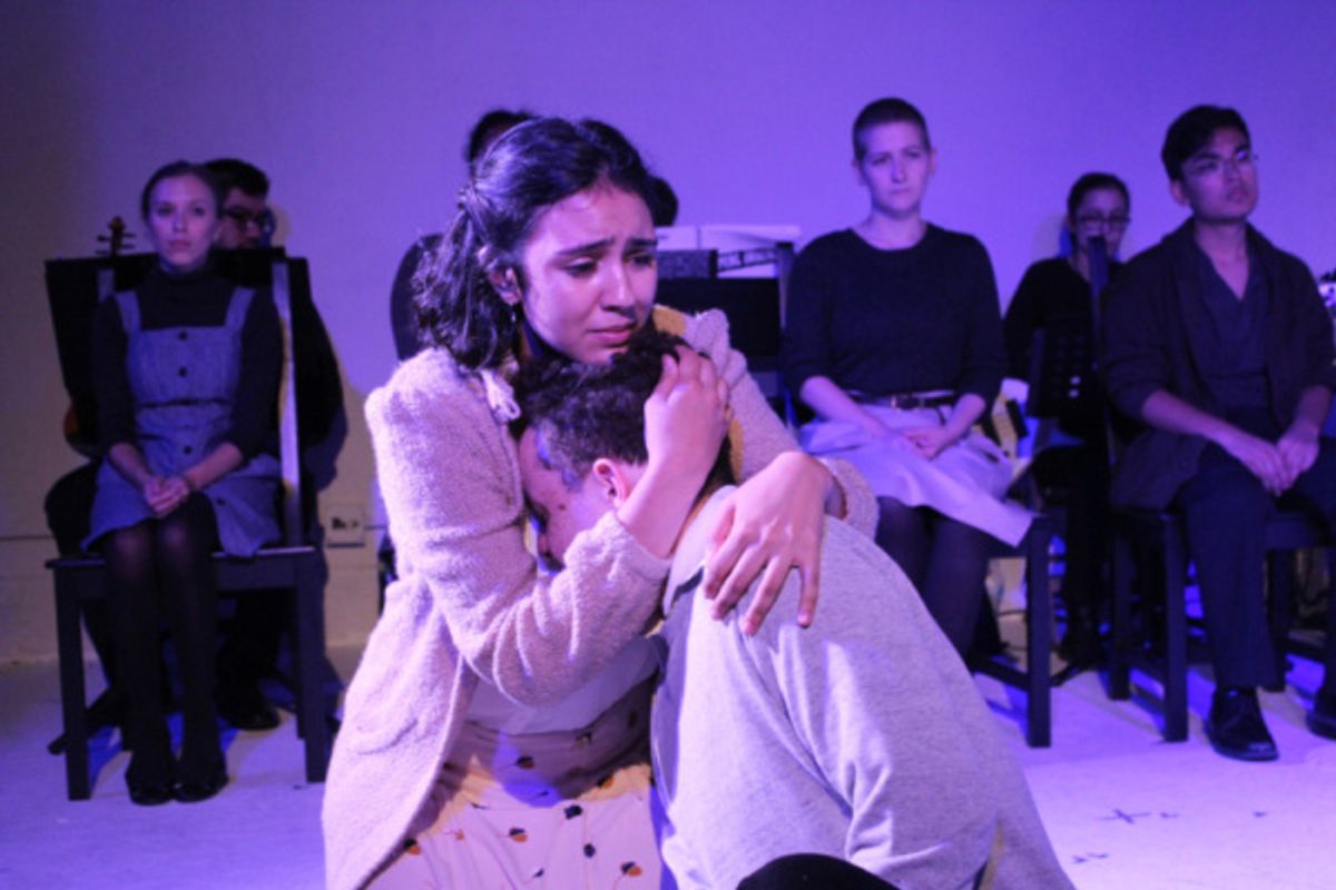 Wendla (Haley Bolithon) comforts Melchior (Jeremiah Alsop) at 