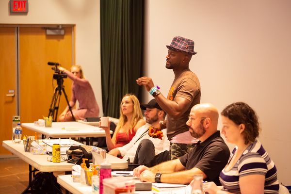 Taye  Diggs  and  the  creative  team  in  rehearsal  for  Thoughts  of  a  Colored   Photo
