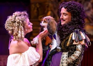Nell Gwynn (Scarlett Strallen) and King Charles II (Timothy Edward Kane) embrace the  Photo